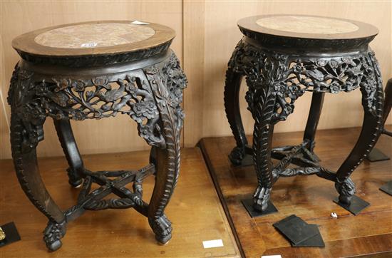 A pair of Chinese marble top tables, 52cm high